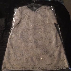 White lace dress with gold sequins