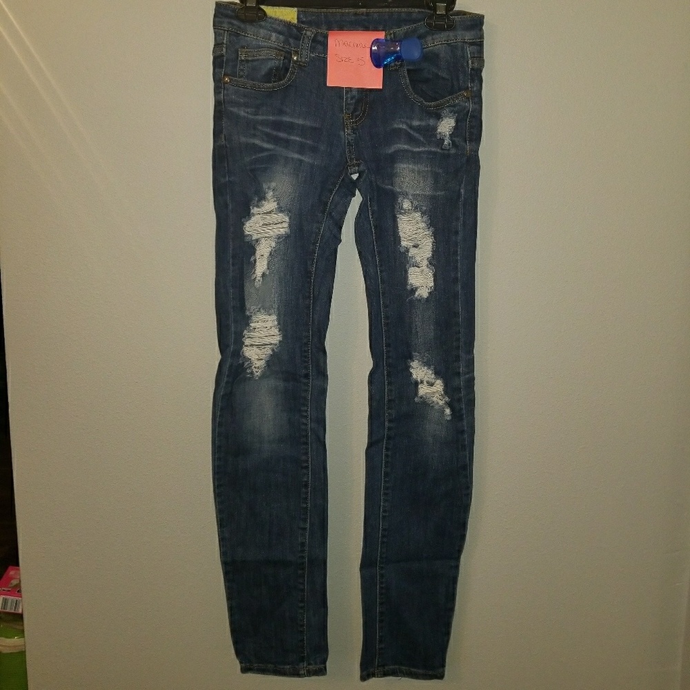 Machine  distressed skinny jeans
