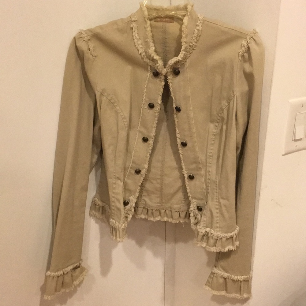 Tan lightweight jacket.