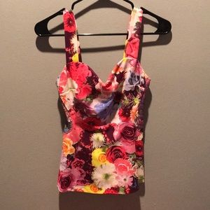 Size XS peplum top by Guess