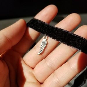 Black velvet choker with angel wing charm