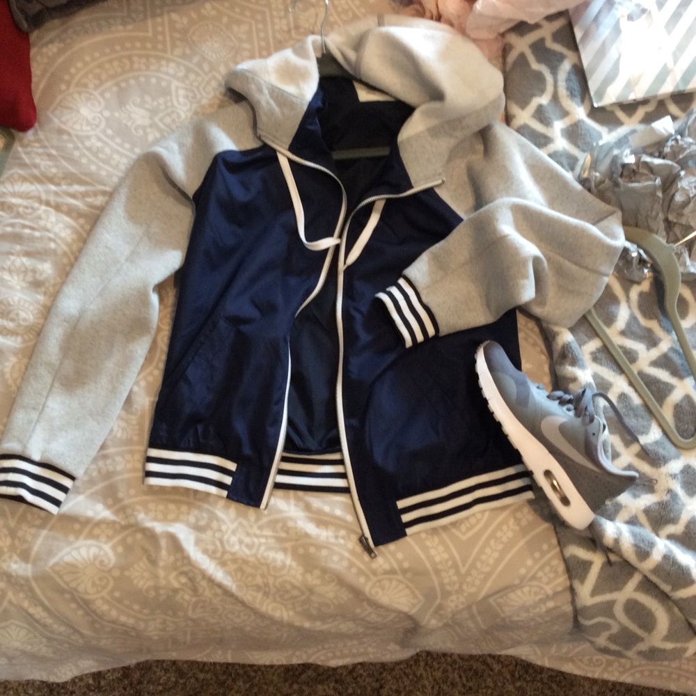 Navy blue and white wind breaker style jacket