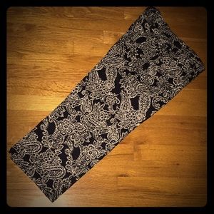 Women's black and white calf-length trousers.