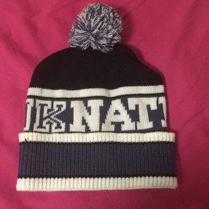 Pink Nation pom pom hat in blue. NWOT.