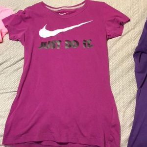 Women’s purple Nike shirt
