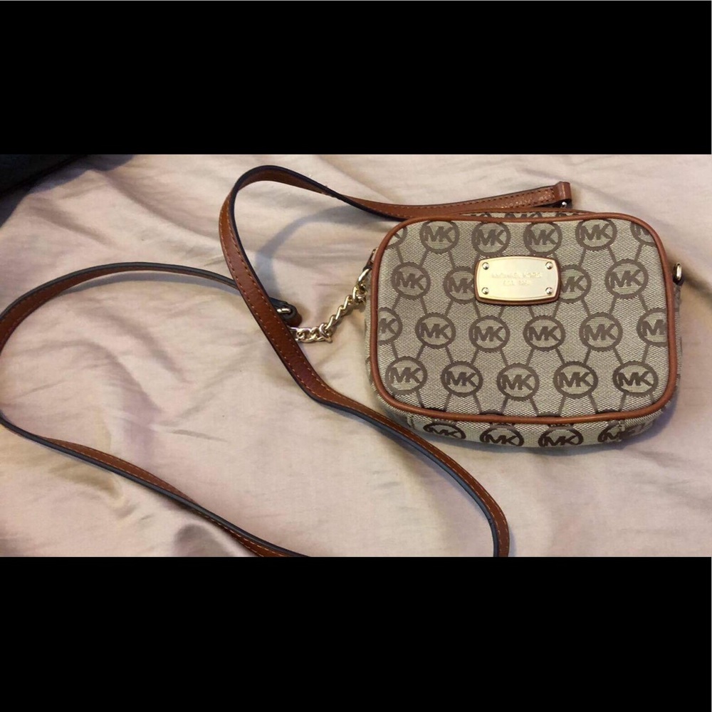 Used michael kors sling bag