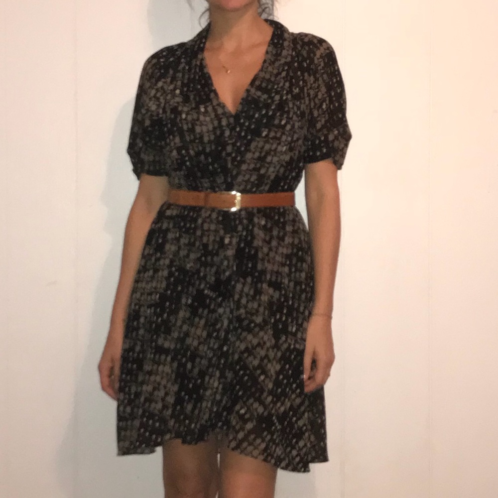 Black and brown specked dress with ruffle front.