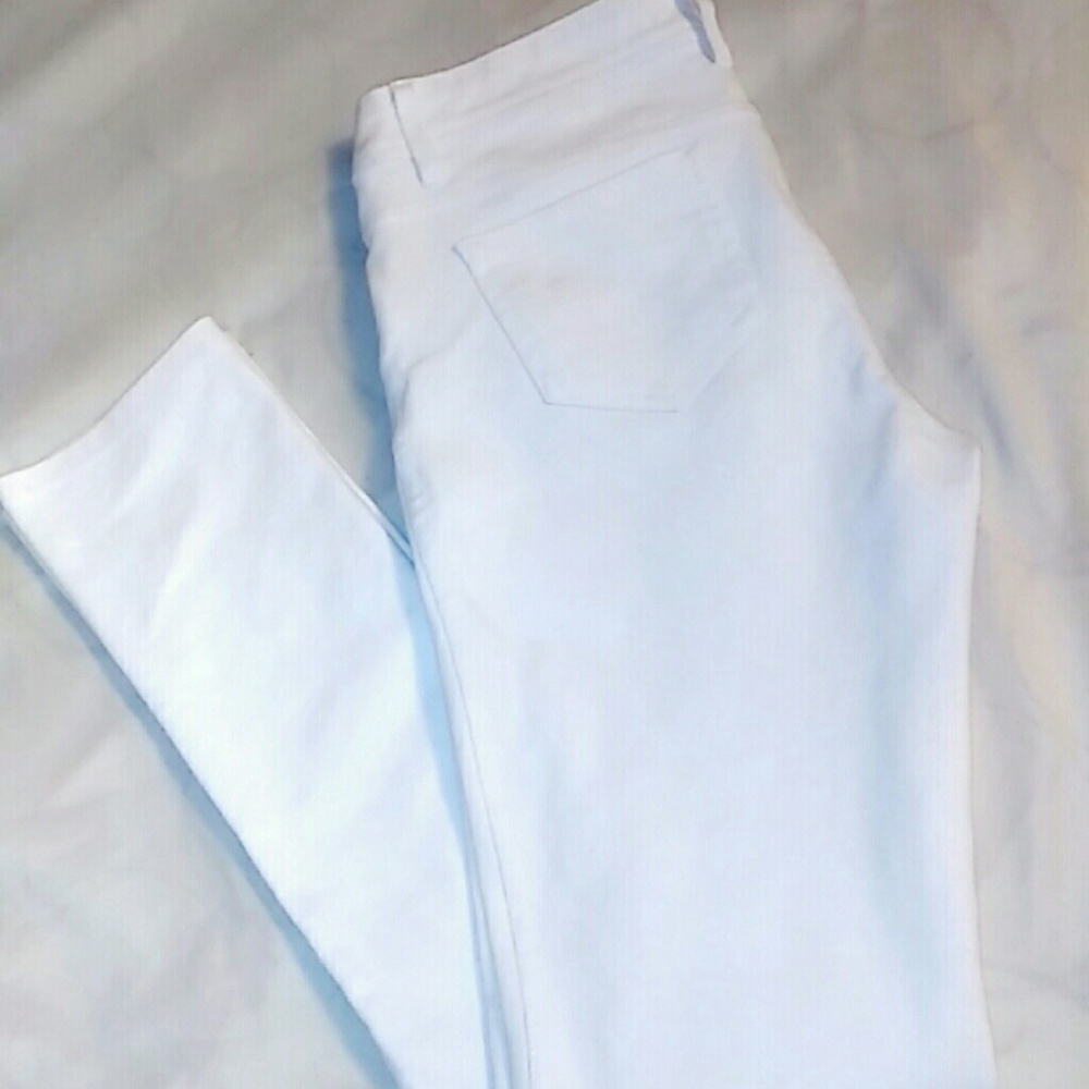 All white Ambiance skinny jeans