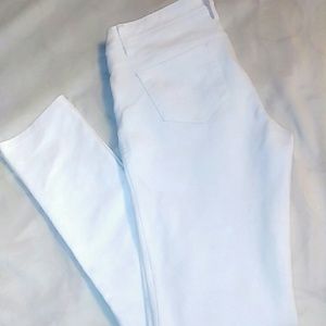 All white Ambiance skinny jeans