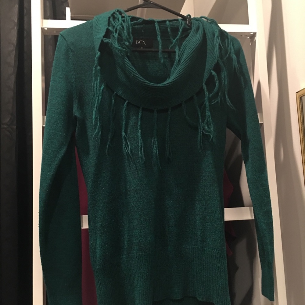 Green cowl neck sweater with fringe