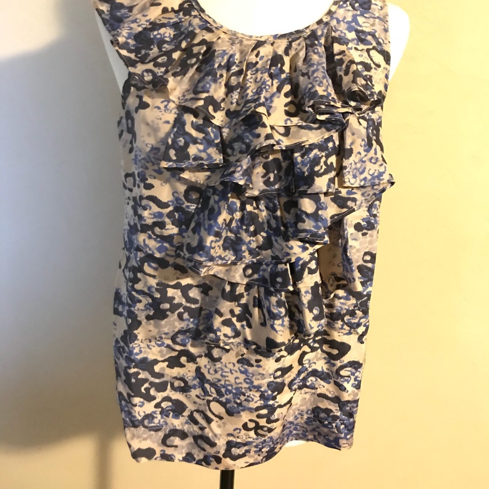 Ruffles sleeveless blouse