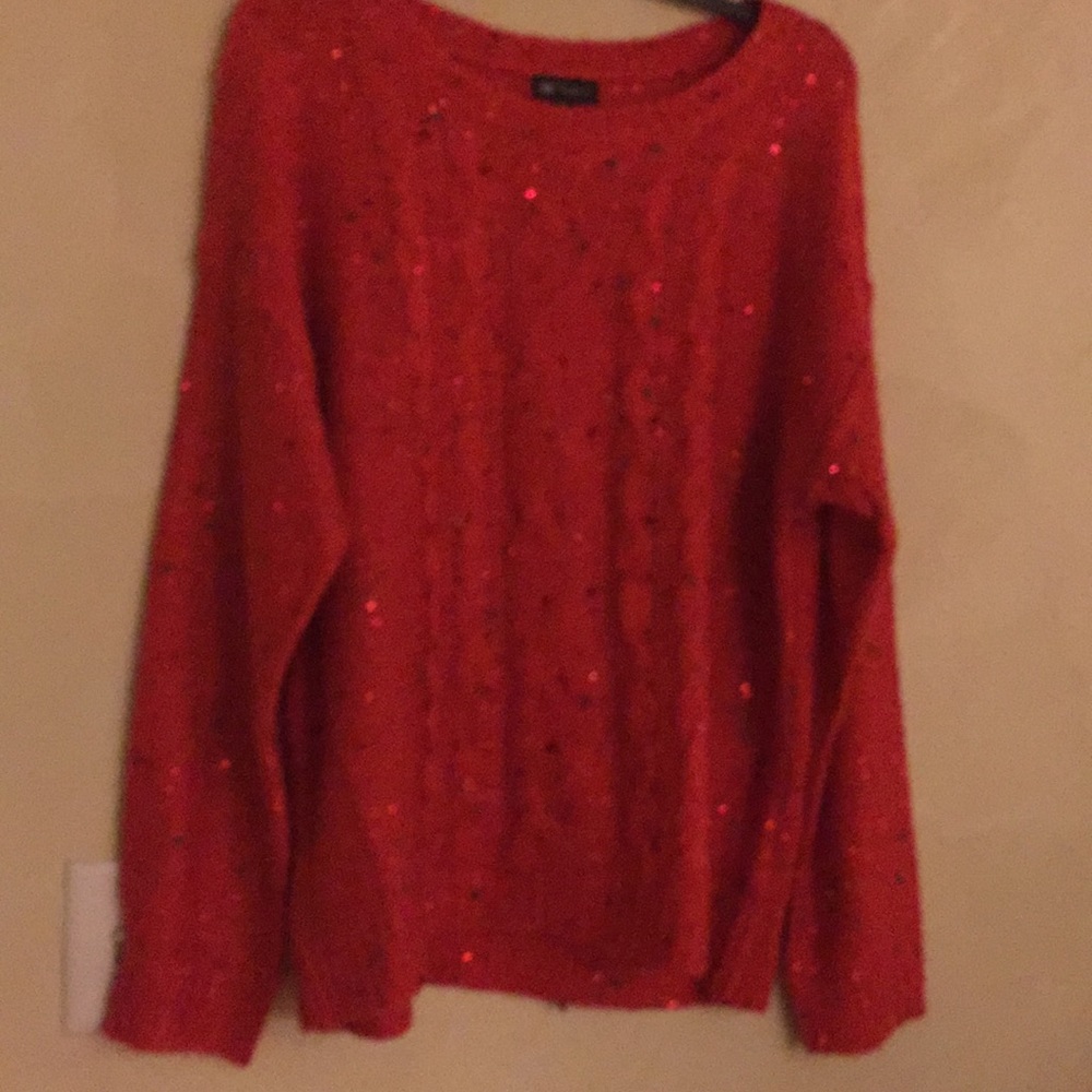 Gorgeous sweater  with sequened  Coral in color