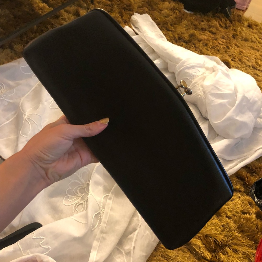 Long black clutch
