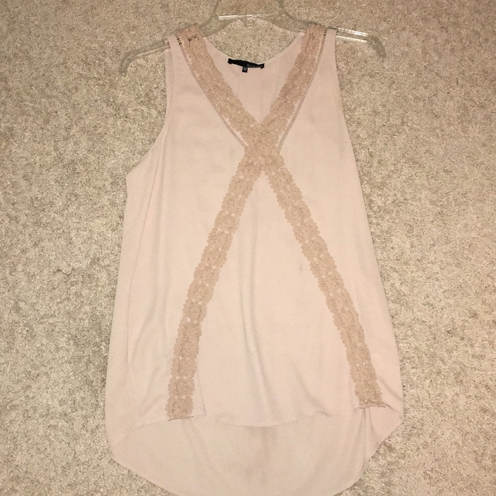 Tan sleeveless top with crochet details