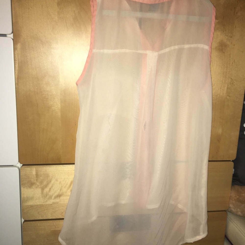 Peach blouse.