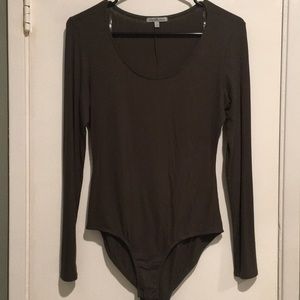 Scoop neck, ribbed long sleeve body suit!