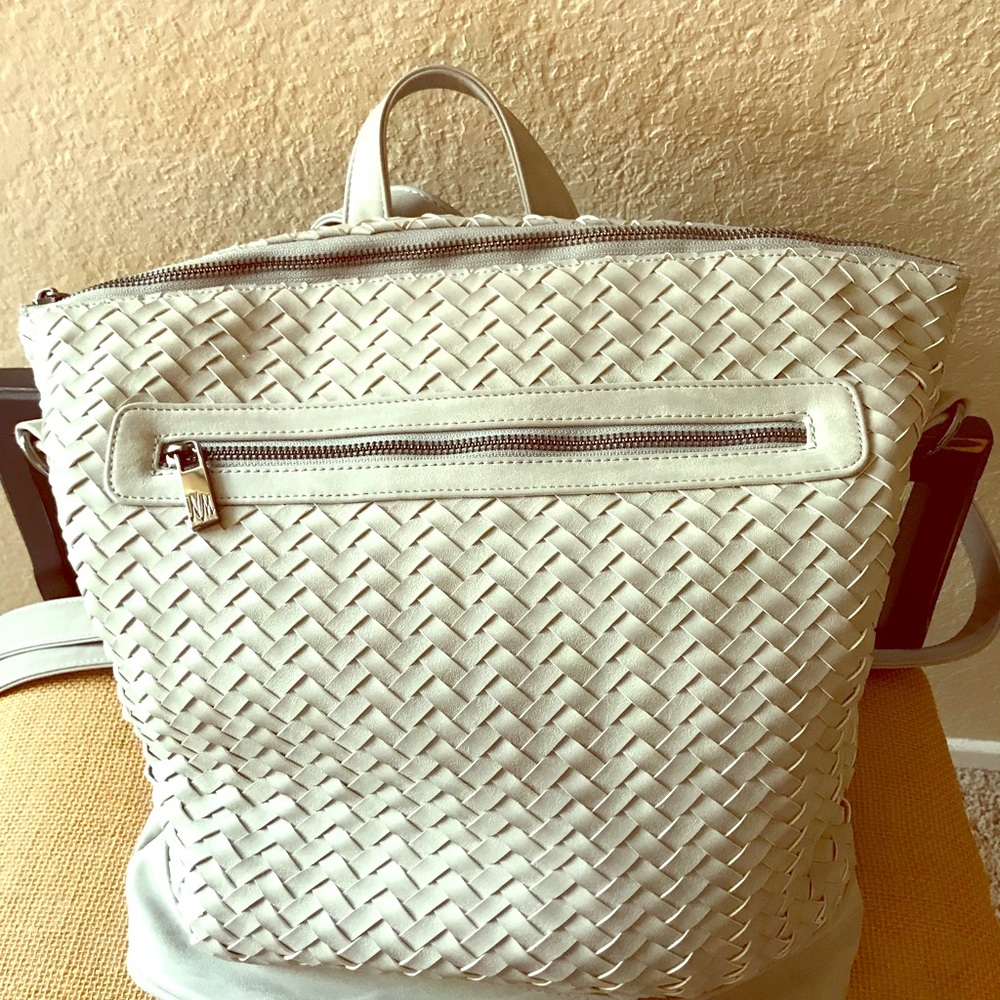Neiman Marcus bag.Polished charcoal metal hardware