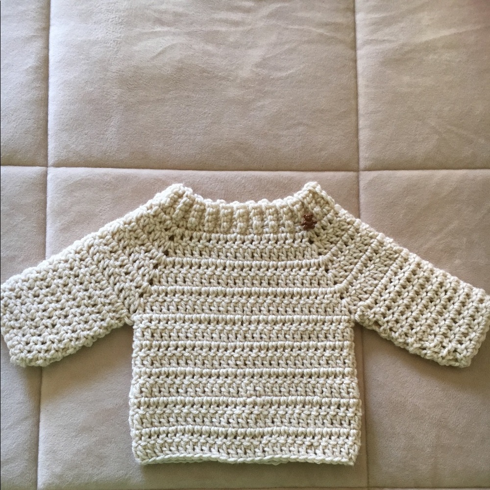 Hand crocheted sweater.