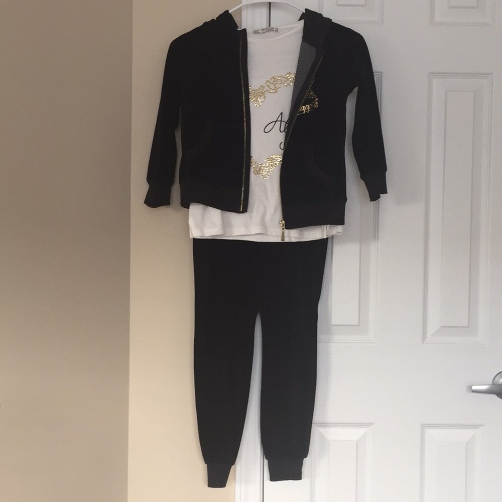 Black velvet trainers and matching shirt