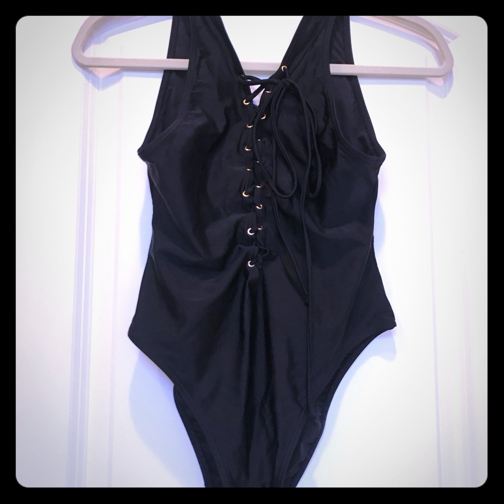 Lace up one piece bathing suit new without tags