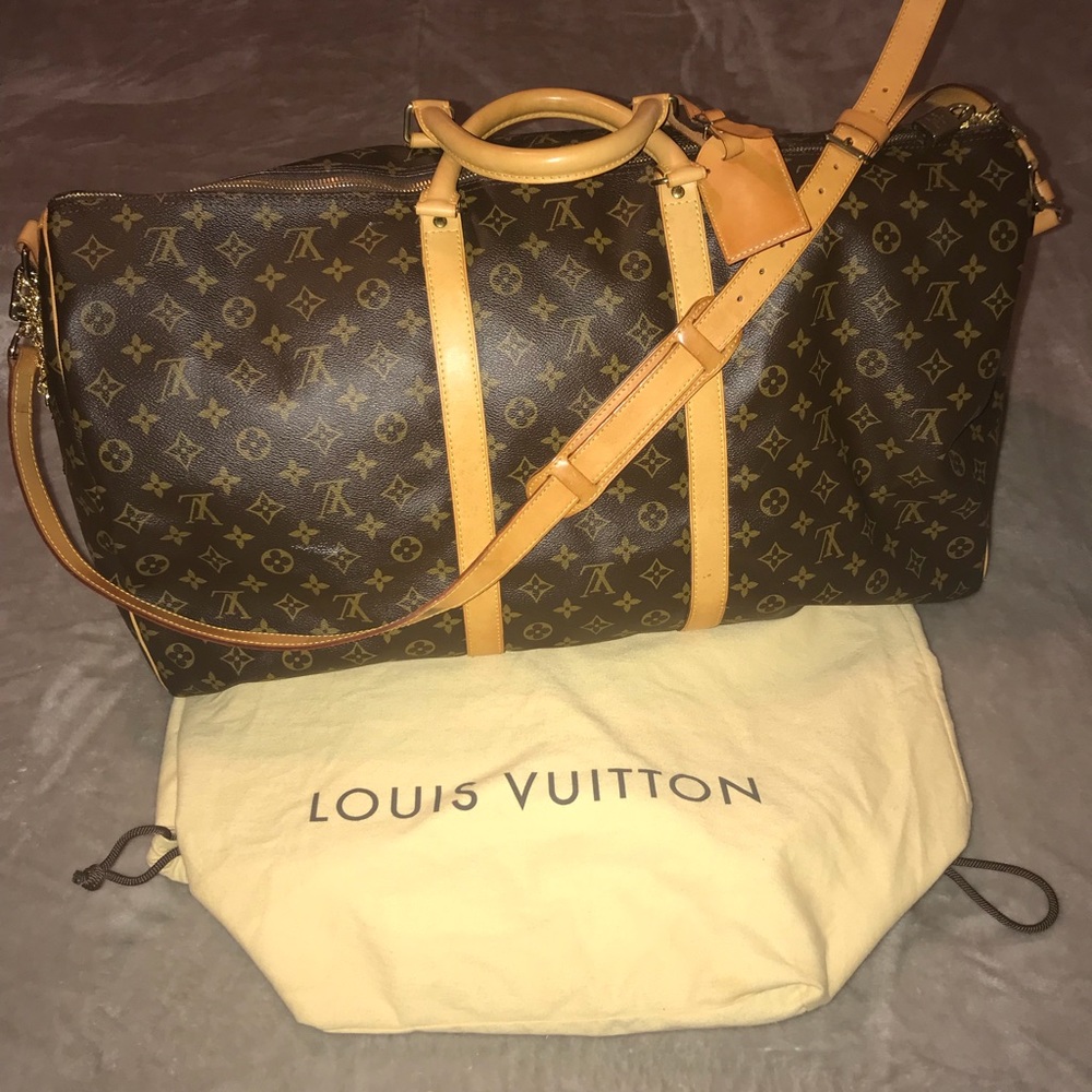 Authentic Louis Vuitton duffle with bag and tag