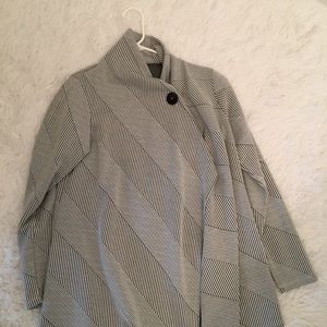 Black and white button poncho. No wear, like new.