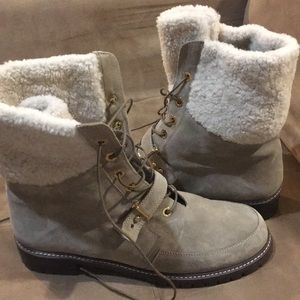 Lush faux-fur trim/lugged sole suede ankle boot.