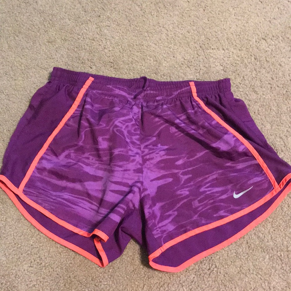 Purple Nike running shorts
