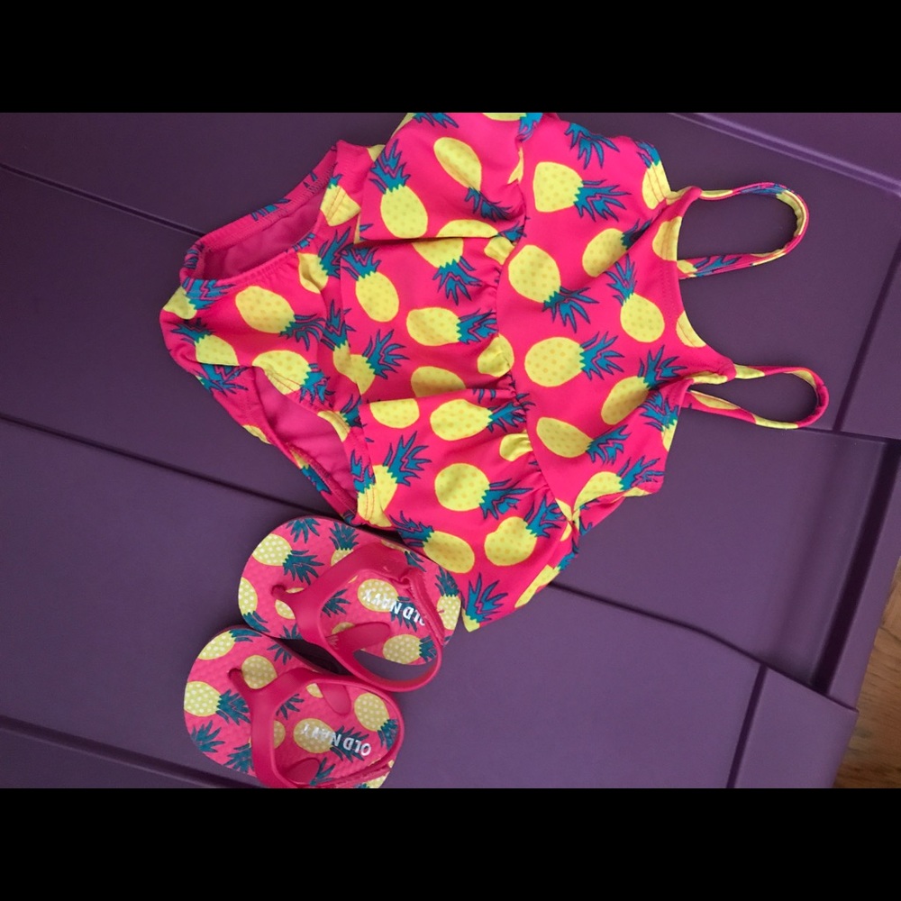 0-3mo bathing suit and flip flops