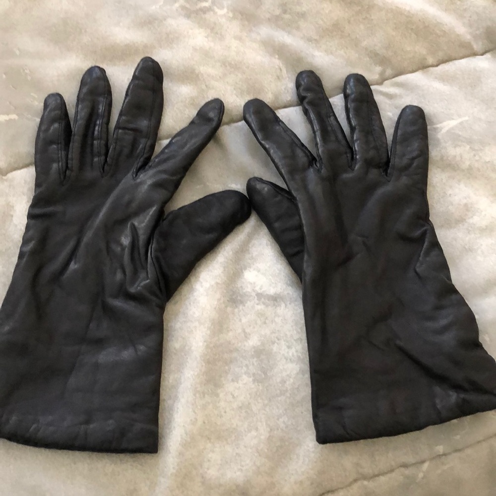 Black genuine leather ladies gloves bed