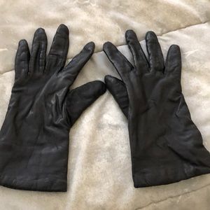 Black genuine leather ladies gloves bed