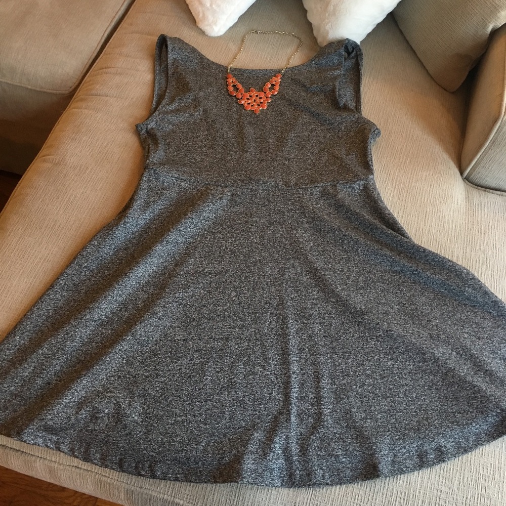 Grey dress with sexy back.