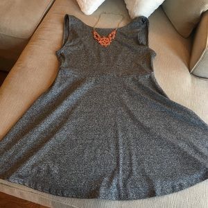 Grey dress with sexy back.