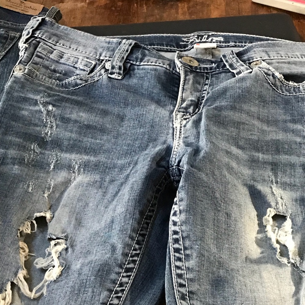 Silver ripped jeans size 28/31