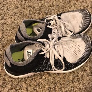 Black, white and grey Nike free