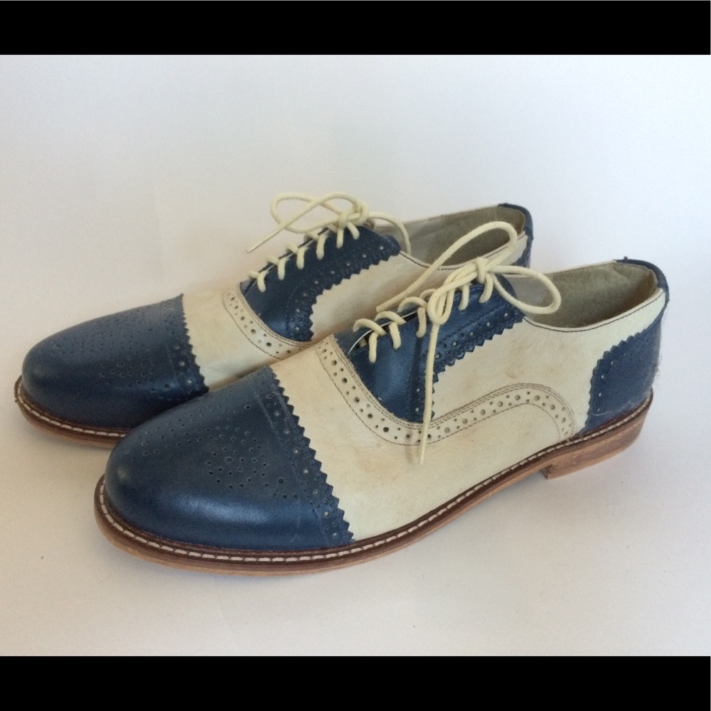 Cooperative wing tip oxfords