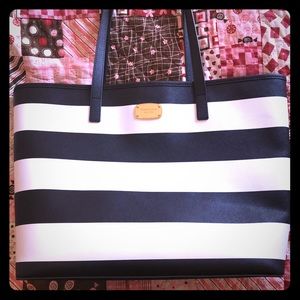 NWT Michael Kors striped bag.  Jet set traveler.