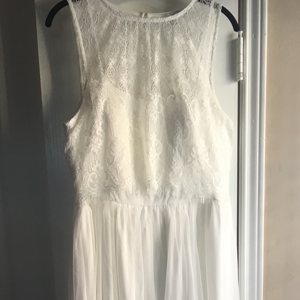 Full length white lace and tulle dress