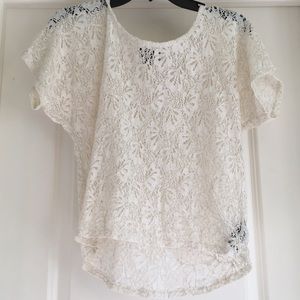 Cream colored sheer lace top