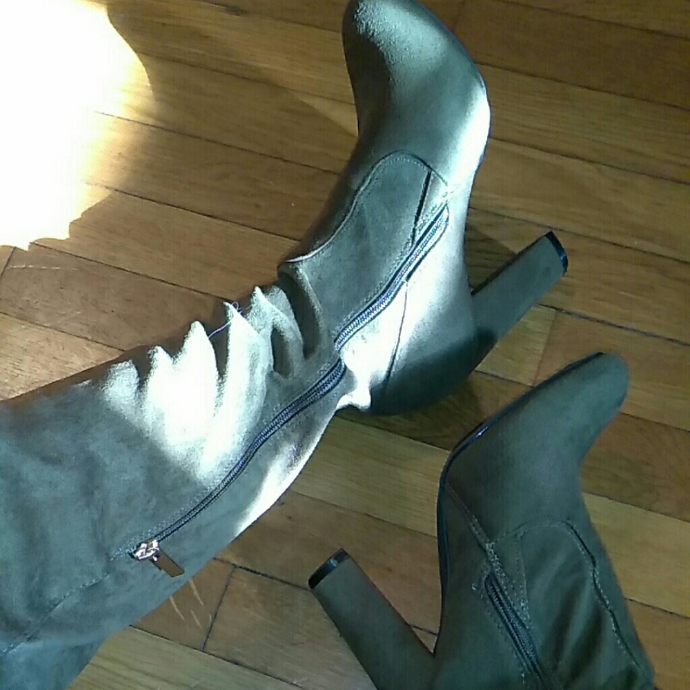 Dark green knee high heel boots