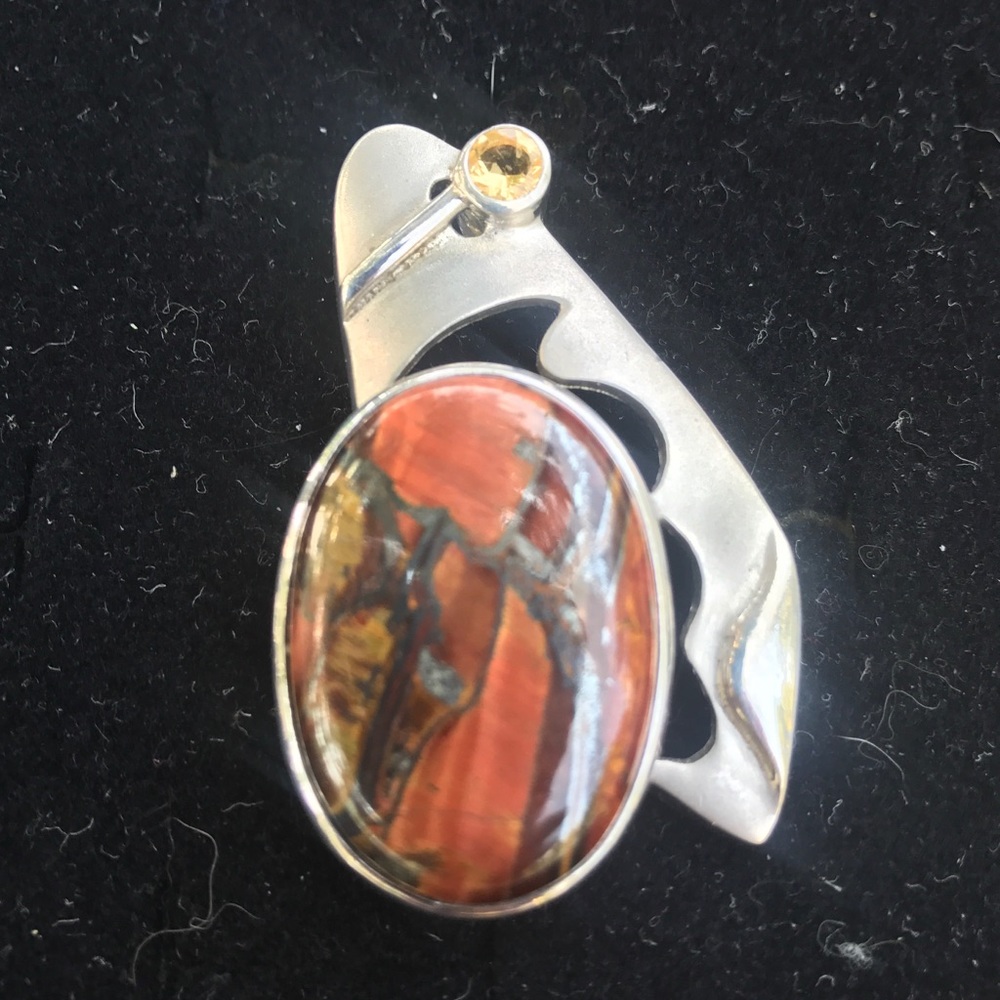 Sterling and platinum silver red tiger eye pendant