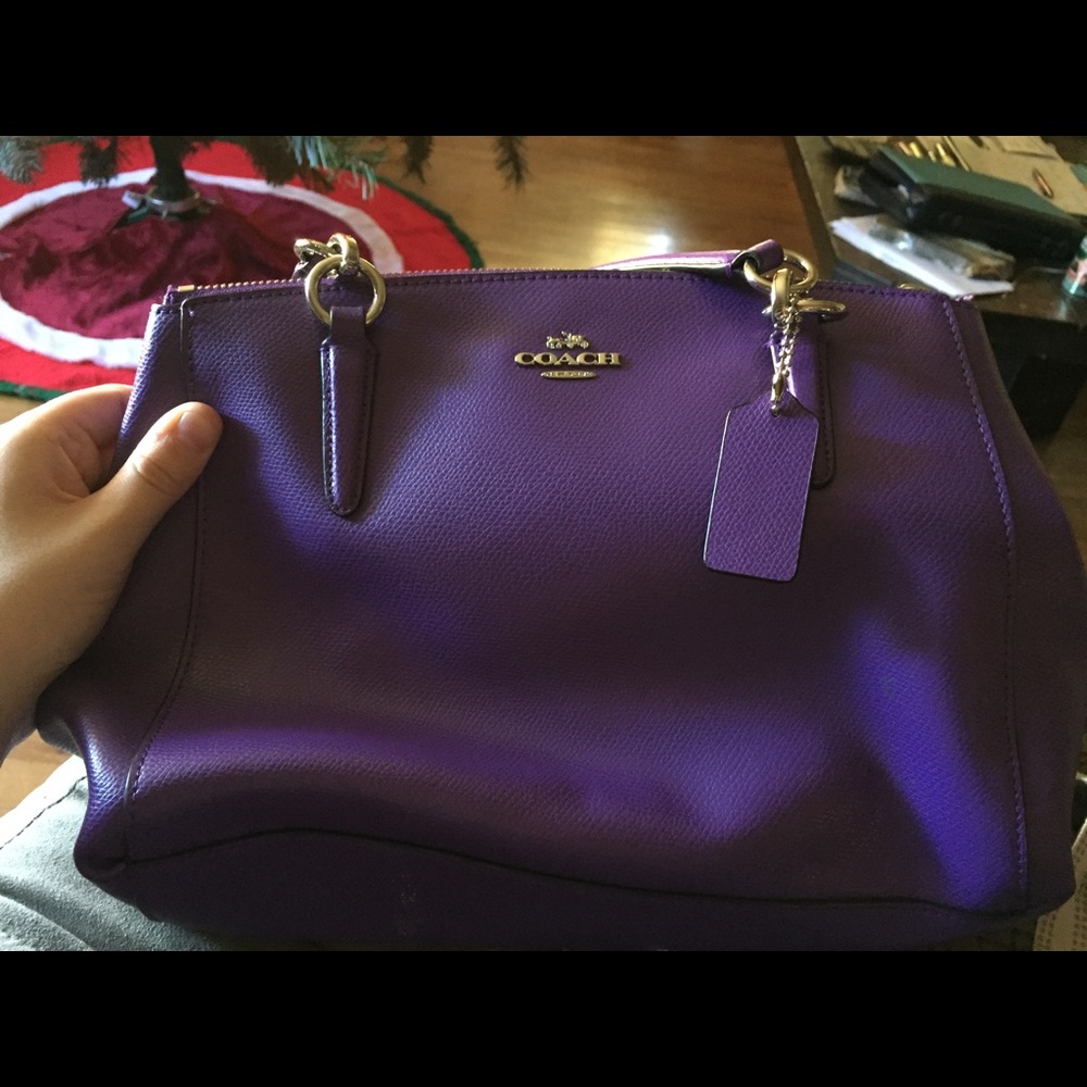 Purple leather coach purse