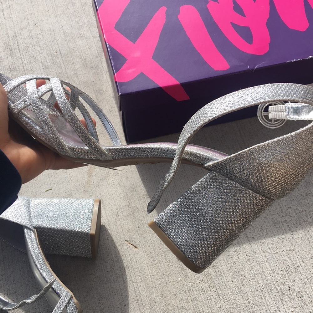 Open toed silver heels