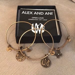 Three Alex and Ani bracelets