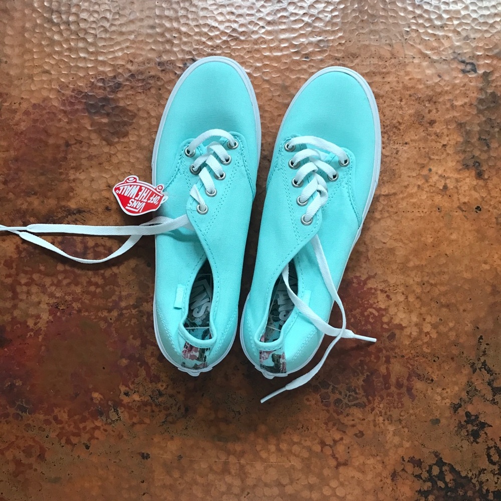 Womens aqua vans.