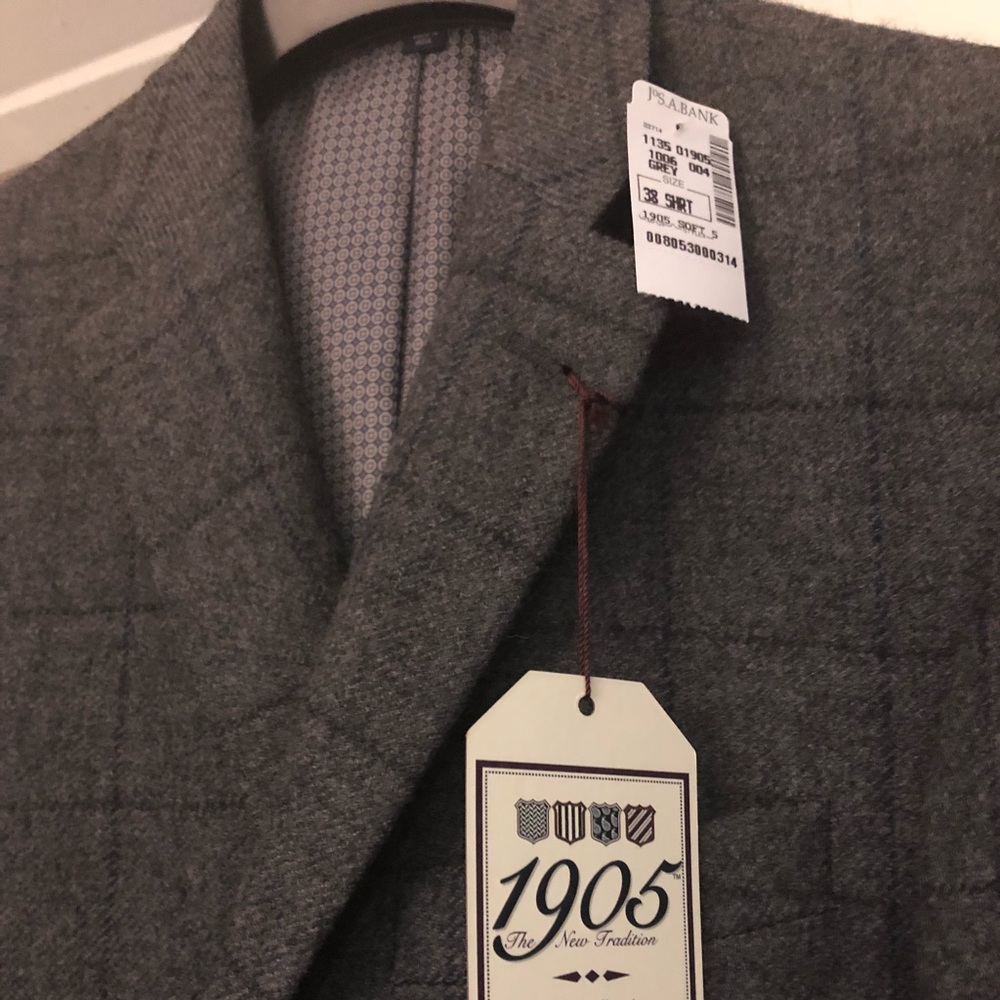 Brand new Jos A Bank Blazer. Tailored fit 38s