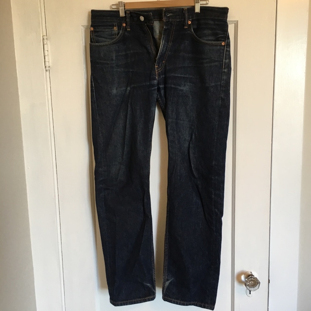 Men’s denim blue jeans by Levi Strauss, size 33-32