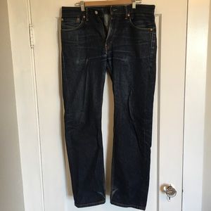 Men’s denim blue jeans by Levi Strauss, size 33-32