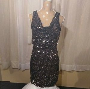 Black sequin dress.  Elastic waist.  Cowl neck.