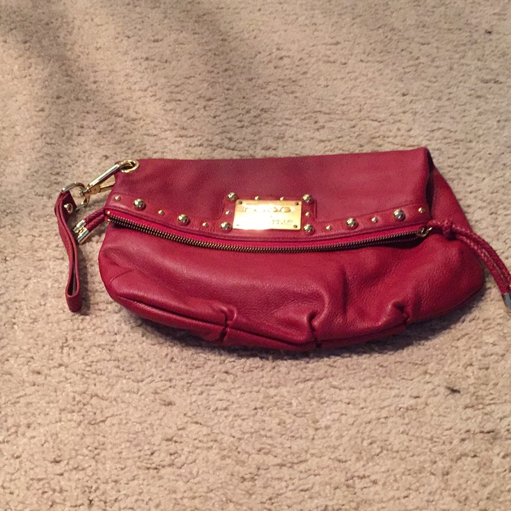 Never worn Bebe red clutch